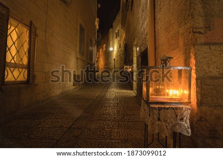 Menorahs are lit, in the Jewish Quarter of the Old City of Jerusalem on Hanukkah