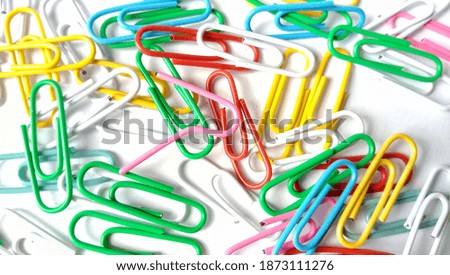 paperclip. a collection of paper clips in a beautiful color. one of the paper clips was damaged. North Sumatra, Indonesia. Saturday, 12 December 2020