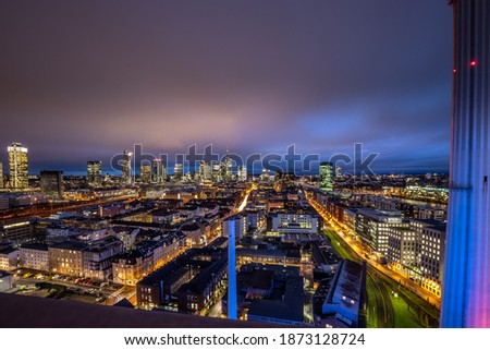 Frankfuert is the only skyline in Germany. backlit photography for sunset with a great sky and lighting in the houses. High-rise buildings, city recording and finance