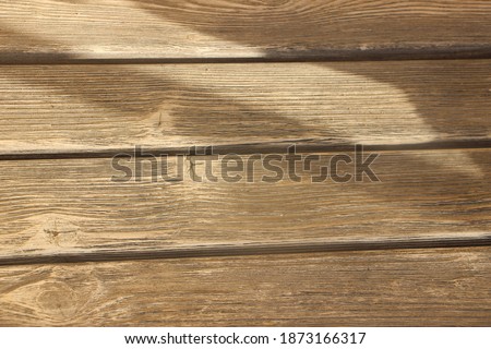 Old wooden planks with rusty nails driven in. Selective focus. Wood texture. Wooden background