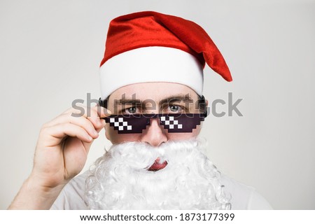 Swag Santa Claus in funny pixelated sunglasses on white background. Gangster, boss, thug life meme. 8bit style. Holly Jolly x Mas Noel. Cool grandfather. Party time, Happy New Year, Merry Christmas