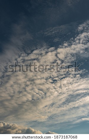 Clouds in the sky. The wonderful spectacle of a sky full of clouds. Depth and three-dimensionality of a cloudy sky.