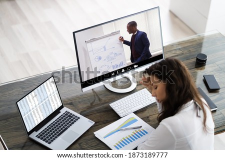 Bored Unhappy Woman Watching Lon Online Virtual Lecture Webinar Royalty-Free Stock Photo #1873189777