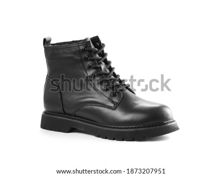 Black leather boots with laces. Close up. Isolated on a white background.