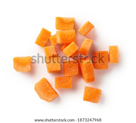 heap of fresh raw carrot cubes isolated on white background, top view Royalty-Free Stock Photo #1873247968