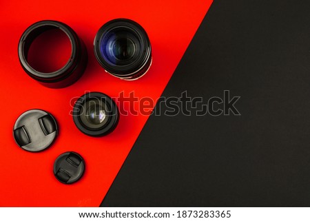 Photographer design, concept with SLR camera lenses, camera set, simple flat background with equipment, copy space