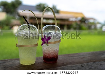 ice juice soda drinks on wooden table 
