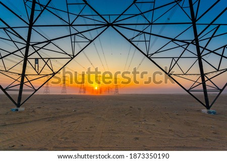 Big Transmission Electrical Post Desert Royalty-Free Stock Photo #1873350190