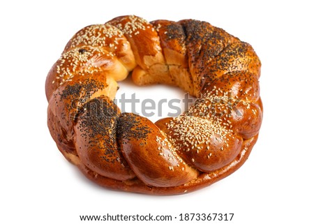 Sweet Bread Wreath. Honey brioche garland isolated on white background. Holiday recipes. Braided Bread.Twist Bread Wreath with poppy seeds and sesame seeds. Christmas Wreath Bread. Babka wreath