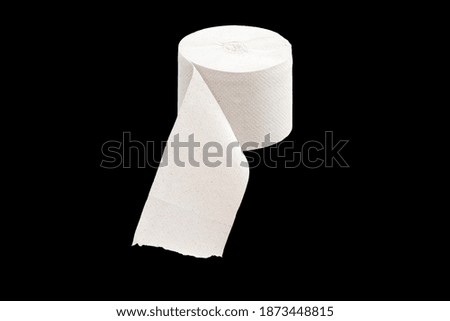 roll of toilet paper isolated on black background