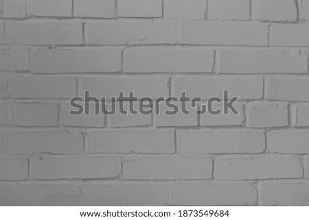 Colored brick wall with trendy color of 2021 - Ultimate gray, copy space