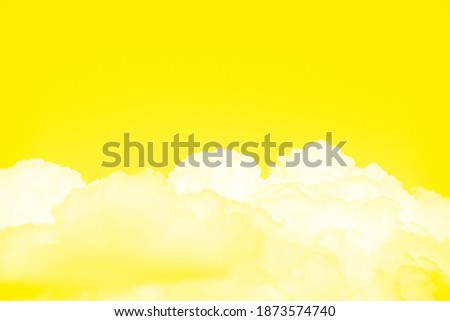 Clouds on a yellow background. presentation of fashion colors 2021