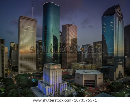 Houston, Texas, USA - November 15, 2020: Downtown Houston at dusk with Houston City Hall at the forefront