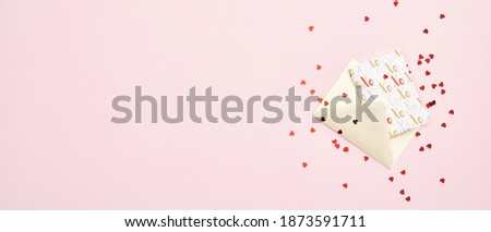 Romantic letter with greeting card and confetti on pink background. Valentines day banner template. Flat lay, top view, copy space.
