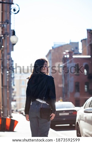 young pretty asian girl outside on big city street, lifestyle people concept