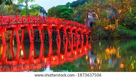 Iconic red bridge named The Huc on Hoan Kiem lake, center of Hanoi, Vietnam Royalty-Free Stock Photo #1873637506