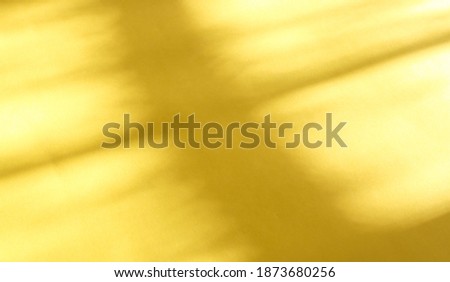Abstract background in fashionable colors of 2021. Illuminating Yellow and Ultimate Gray. Sunlight and shade.