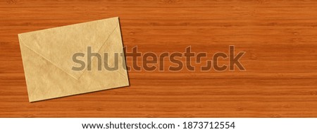 Brown paper enveloppe mockup template isolated on horizontal wooden banner