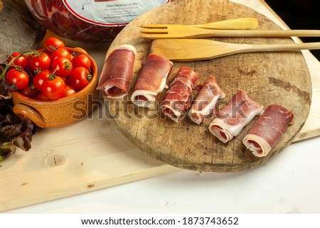 snack board with ham and vegetalin italy