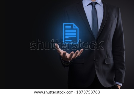 Businessman man holding a document icon in his hand Document Management Data System Business Internet Technology Concept. Corporate data management system DMS .
