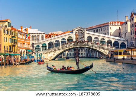 Gondola near Rialto Bridge in Venice, Italy Royalty-Free Stock Photo #187378805