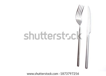 table set on white background with drop of water