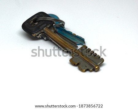 Keys to a house on white background      