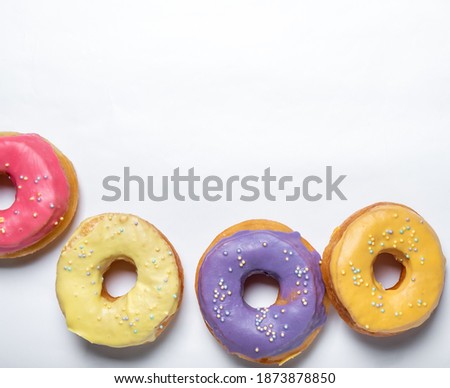 donuts on a white background with place for text. View from above.