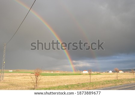 The rainbow that appears in the field after the rain