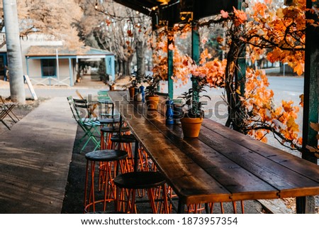 Al fresco dining outside of the cafe, Cliffy's Emporium in small town Daylesford, Victoria, Australia during autumn Royalty-Free Stock Photo #1873957354