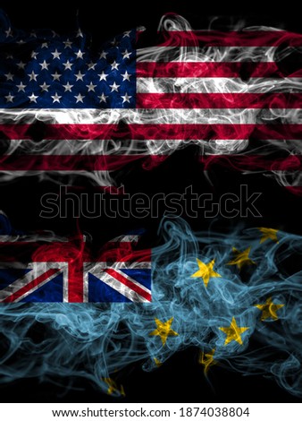 United States of America, America, US, USA, American vs Tuvalu smoky mystic flags placed side by side. Thick colored silky abstract smoke flags