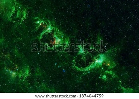 Green galaxy in deep space. Elements of this image were furnished by NASA.