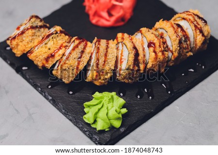 sushi rolls tempura,japanese food style ,Traditional Japanese cuisine, Crunchy Shrimp Tempura Roll.