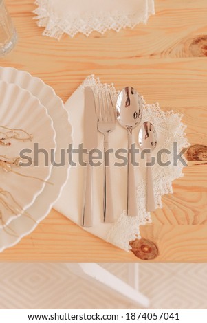 cutlery on a wooden table