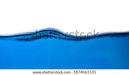 water surface with a wave on blue background