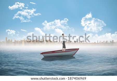 Composite image of attractive peaceful businesswoman posing in a sailboat in the sea with city on horizon