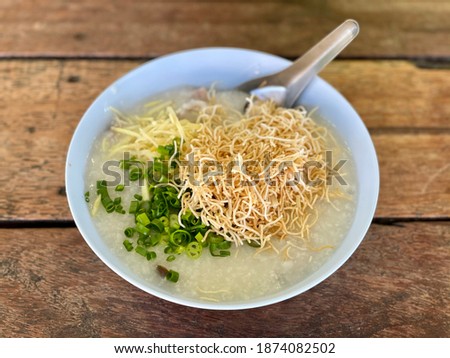 Pork Congee on the wooden table
