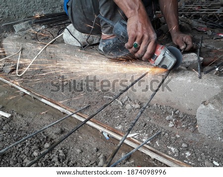 someone who was cutting iron, so that it gave off sparks