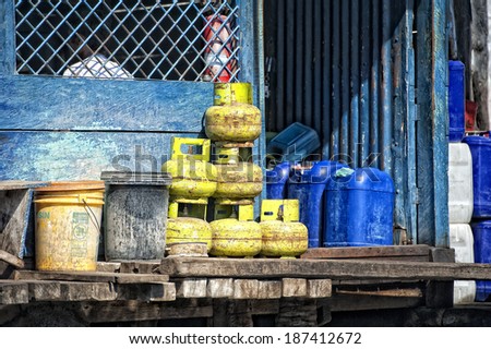Gas yellow tanks in indonesia harbor in Sulawesi
