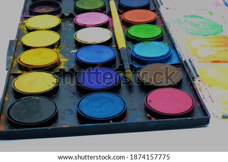 isolated on white background. Colorful watercolor set background with brush. used watercolor painting palette. in a square plan.