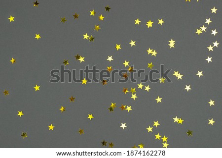 Yellow stars on a gray background.
