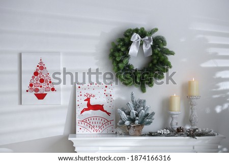 Beautiful Christmas pictures in festive room interior