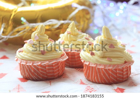 Picture of three cupcakes on the table