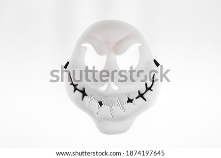 scary snowman mask isolated on white background