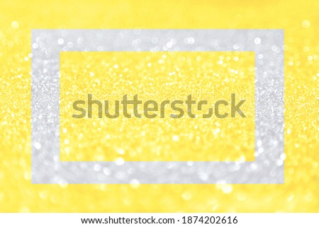 Beautiful festive frame yellow grey shine glowing illuminating background blur, ultimate radiance. Perfect background color 2021. The trend of the spring and summer season the fashion design industry.