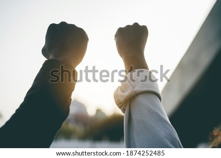 Black people holding hands during no racism protest - Empowerment and equal rights concept - Soft focus on right hand Royalty-Free Stock Photo #1874252485
