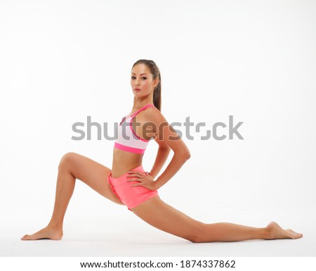 Yoga and sport concept - Beautiful young woman doing yoga, isolated on white background