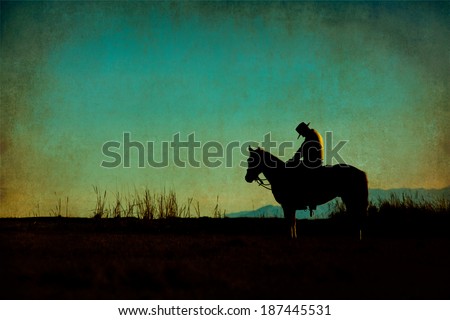 Western cowboy silhouette with texture at sunset and slivers of light