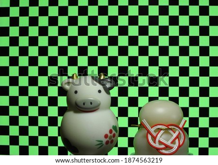 Japanese New Year decorations, checkered patterns, cow models and rice cakes