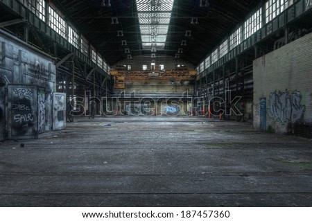 Old hall with an old floating crane Royalty-Free Stock Photo #187457360